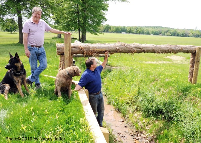 Essex Horse Trials co-chairs Ralph Jones and Morgan Rowsell show off the Advanced division’s Liberty Corner Leap, a work in progress during my visit to Moorland Farm. (Photo©2019 by Nancy Jaffer)